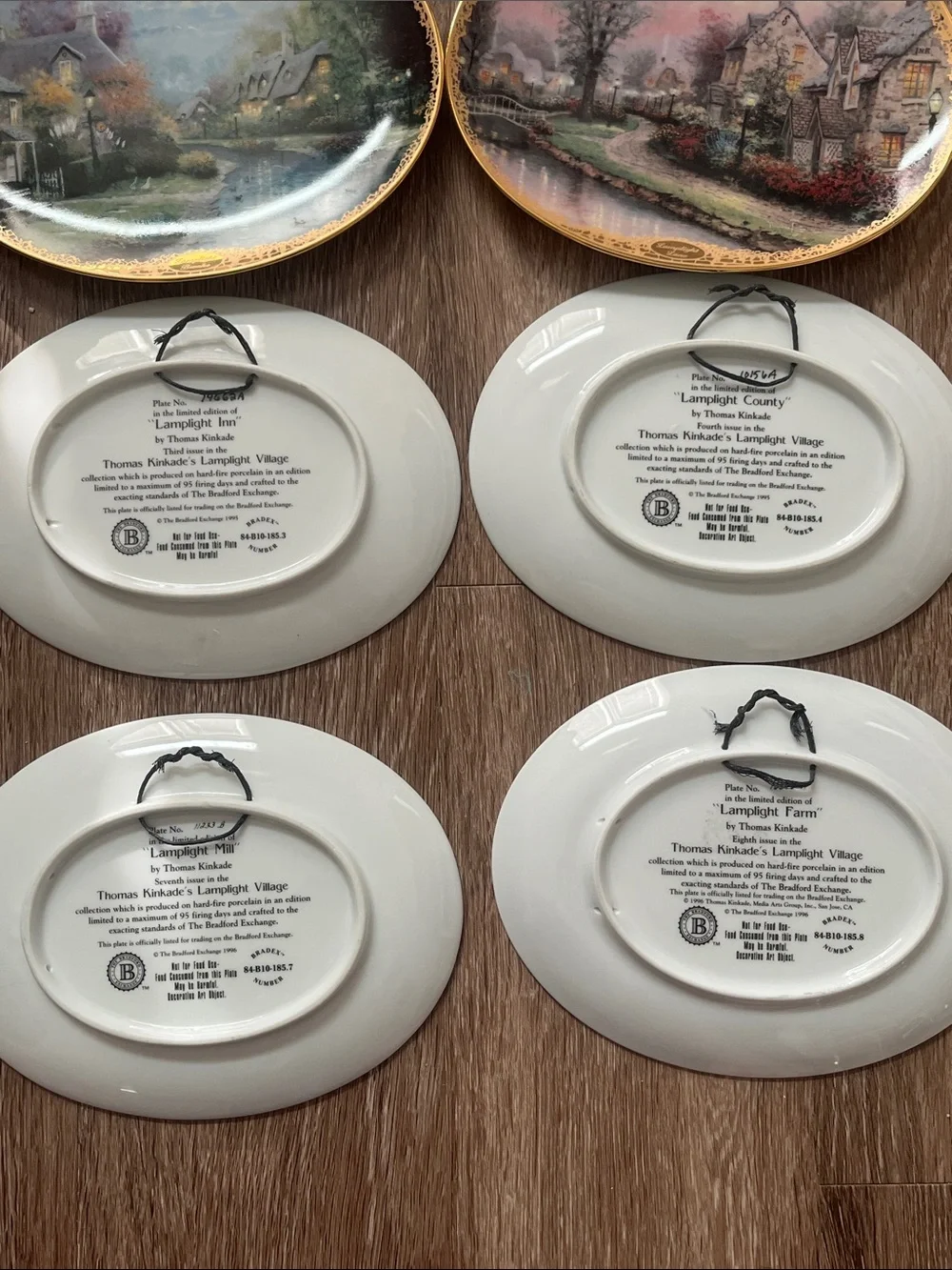 Thomas Kinkade Lamplight Village complete plate set (8)
